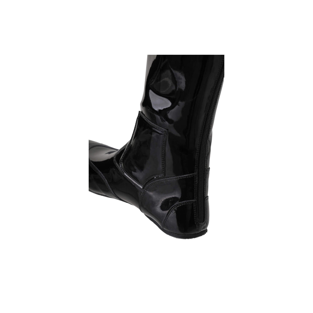 A single tall racing boot displayed on a white background. The boot is made of black material with a black patent leather accent around the calf. It features a back zip and a 1.5-2cm stretch feature around the calf. This image displays the boot from a back perspective.