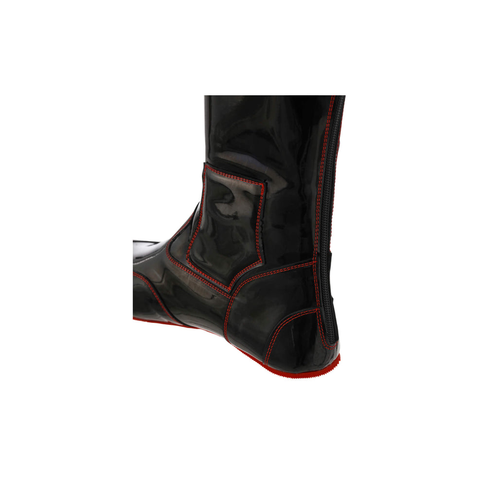 A single tall racing boot made of black material with red exterior stitching and red soles, displayed against a white background. The boot features a back zip and a 1.5-2cm stretch feature around the calf. This image only displays the boot showcased from the back perspective.