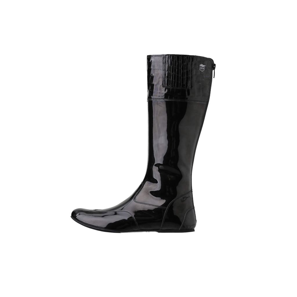 A single tall racing boot displayed against a white background. The boot is made of black material with black crocodile leather accent around the calf area. It features a back zip and a 1.5-2cm stretch feature around the calf. This image only showcases one boot from a side perspective.