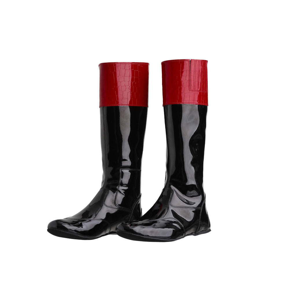 A pair of tall racing boots against a white background. The boots are made of black material with red crocodile leather accents around the calf. They feature a back zip and a 1.5-2cm stretch feature around the calf. Both shoes are positioned sole down with the zipper done, angled slightly to one side.