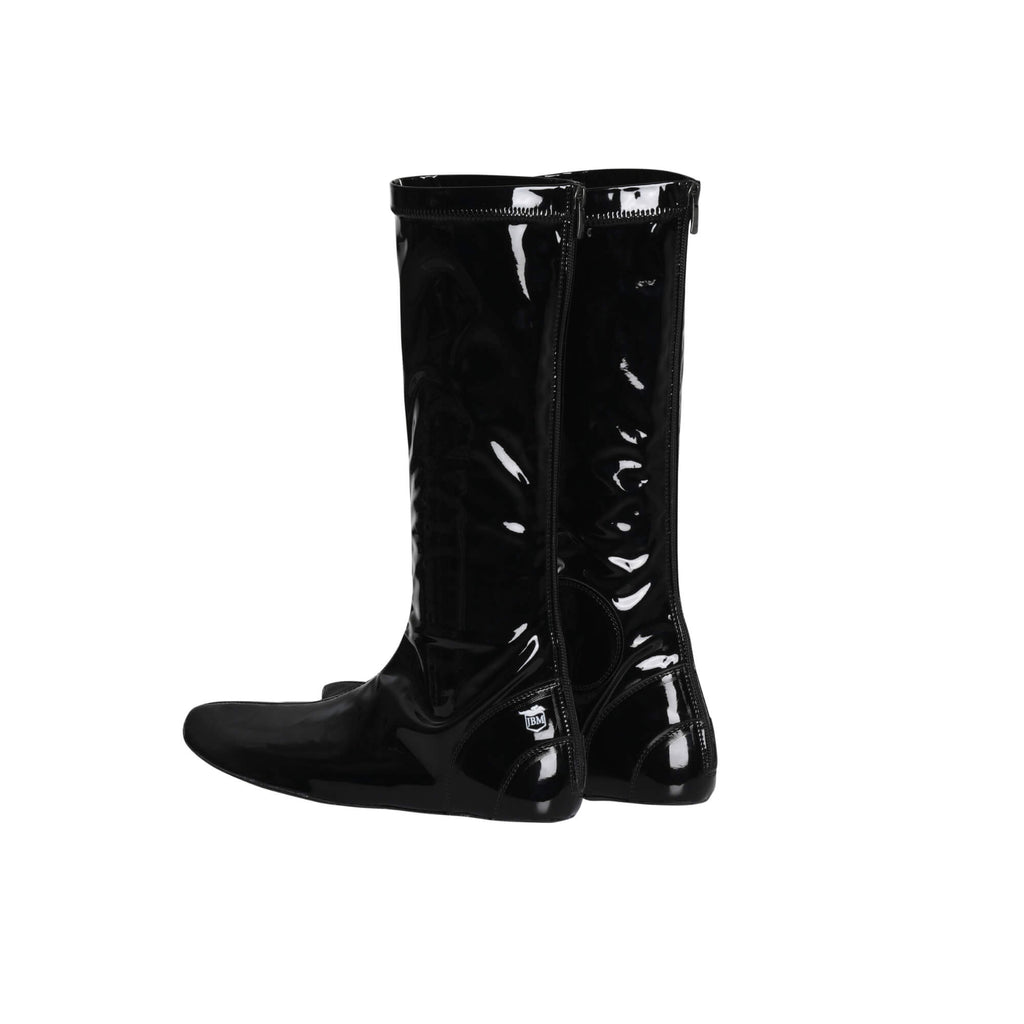 Glossy black Lite Racing Boots with a back zip, tall design, and reinforced toe and ankle areas for riders seeking lightweight performance. Boots are displayed upright against a white background, showcasing the side back view.