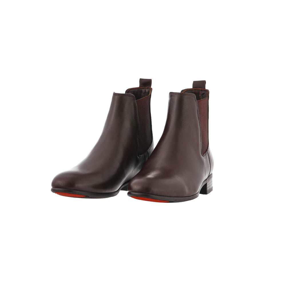 A pair of classic brown leather boots with an easy slide-in design, showcased on a white background. The pair is displayed sole down, with the angle slightly positioned to one side for a stylish presentation.