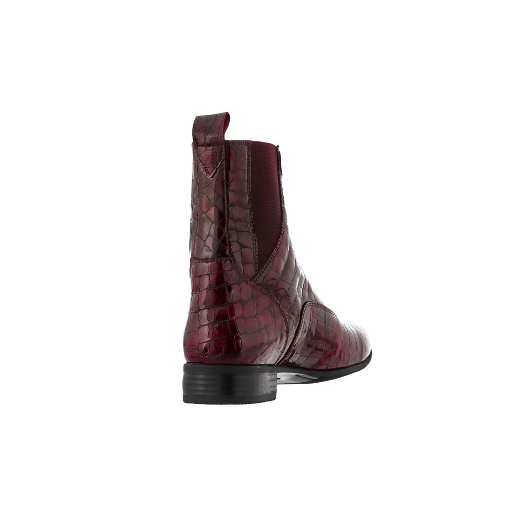 A back view of a burgundy crocodile leather boot, displayed against a white background.