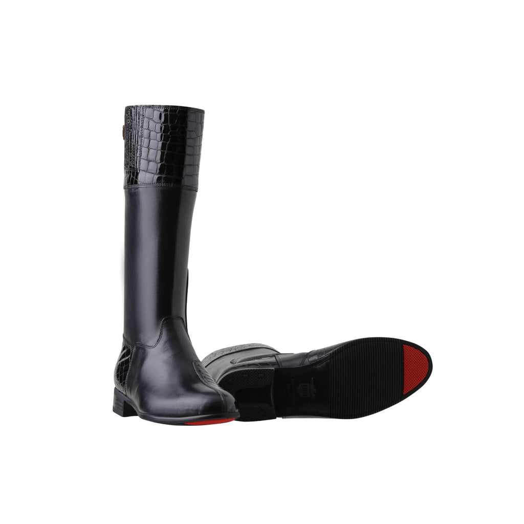 A pair of tall black leather boots with black crocodile accents, displayed on a white background. One boot is positioned sole down, showcasing the back zip and a 1.5-2cm stretch feature on the calf area. The other boot is laid down to display the sole, featuring a red tip design.