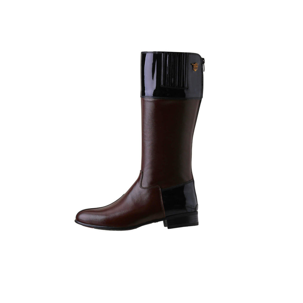 A side view of a brown tall boot with black patent accents on the top and bottom. Features a back zip and a 1.5 - 2cm ability to loosen the calf area if required. Displayed against a white background.