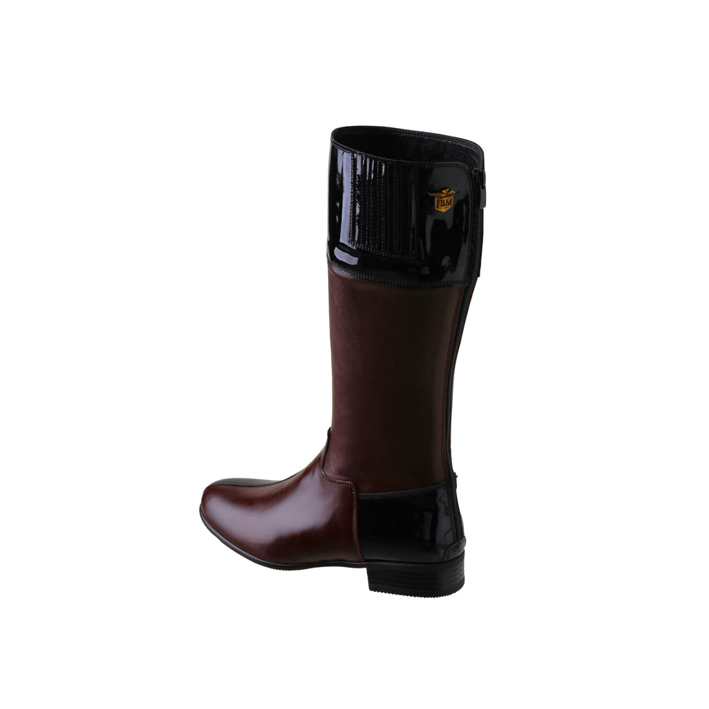 A side-back view of a brown tall boot with black patent accents on the top and bottom. Features a back zip and a 1.5 - 2cm ability to loosen the calf area if required. Displayed against a white background.