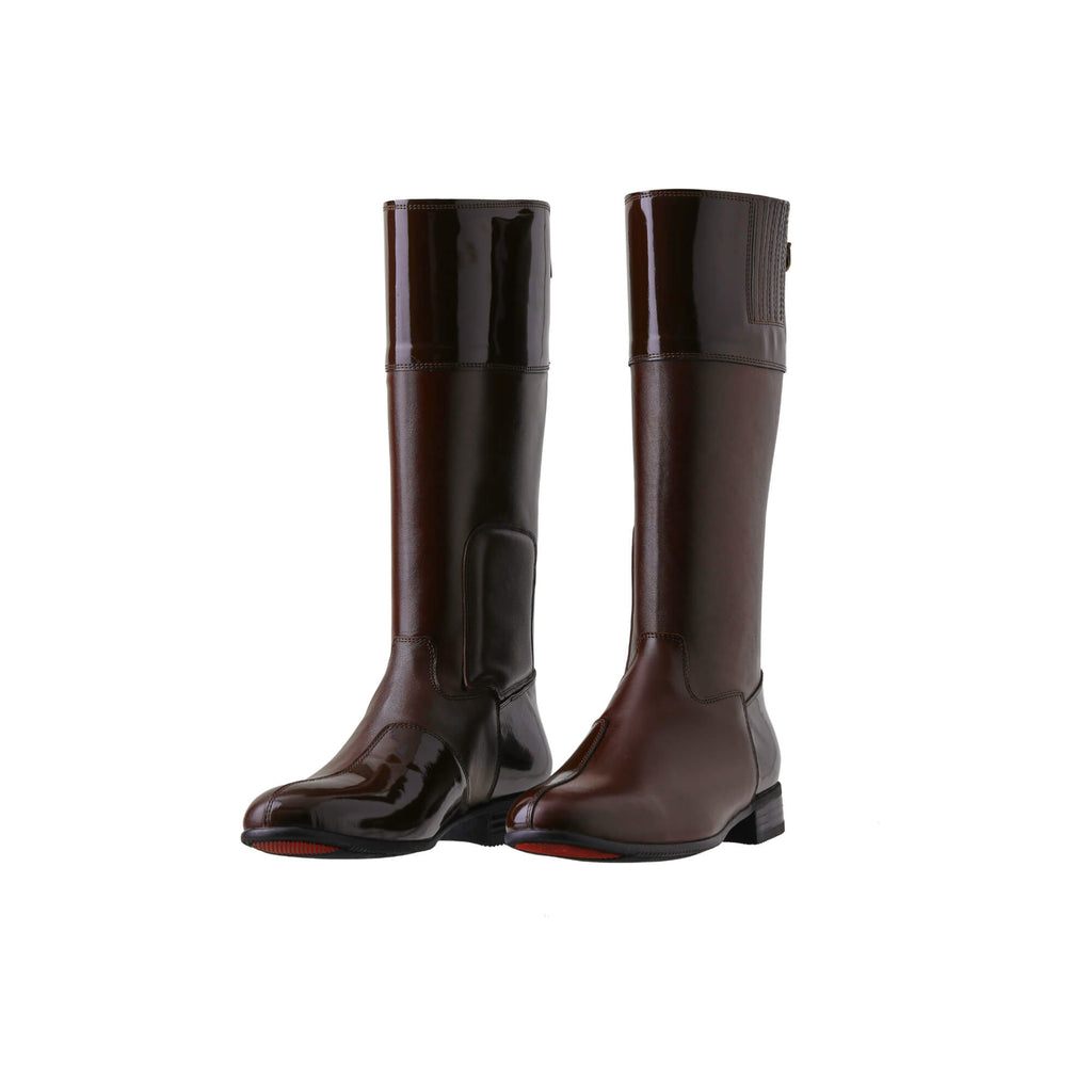 A pair of tall racing boots displayed against a white background. Made of brown leather with brown patent leather wrapping around the calf, they feature a back zip and a 1.5-2cm stretch feature on the calf area. Both shoes are positioned sole down with the zipper done, angled slightly to one side.