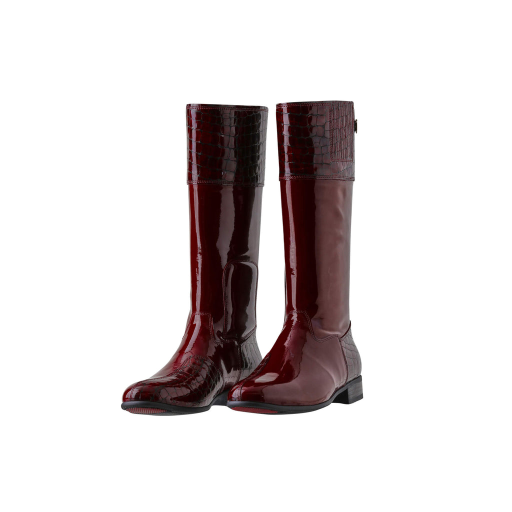 A pair of tall burgundy patent and crocodile leather boots displayed against a white background. The boots feature a back zip and a 1.5-2cm stretch feature on the calf area. Both shoes are positioned sole down with the zipper done, angled slightly to one side.