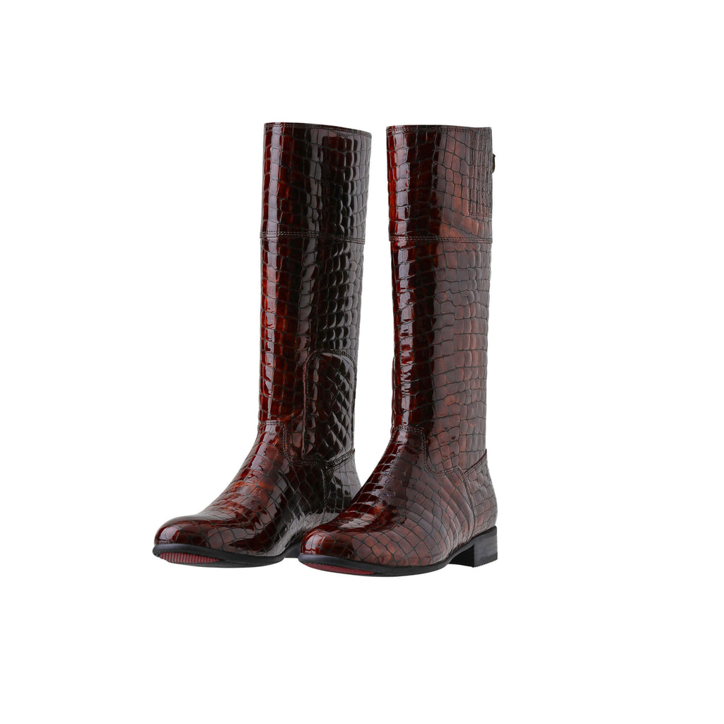 A pair of brown crocodile leather tall boots featuring a back zip and a 1.5 - 2cm ability to loosen the calf area if required. Displayed on a white background with the soles down. Zips are done, boots are slightly positioned to one side.