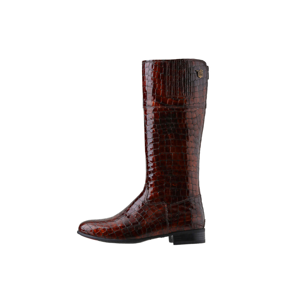 A brown crocodile leather tall boot featuring a back zip and a 1.5 - 2cm ability to loosen the calf area if required. Displayed against a white background. The image shows one boot from a side perspective, with the zip done.