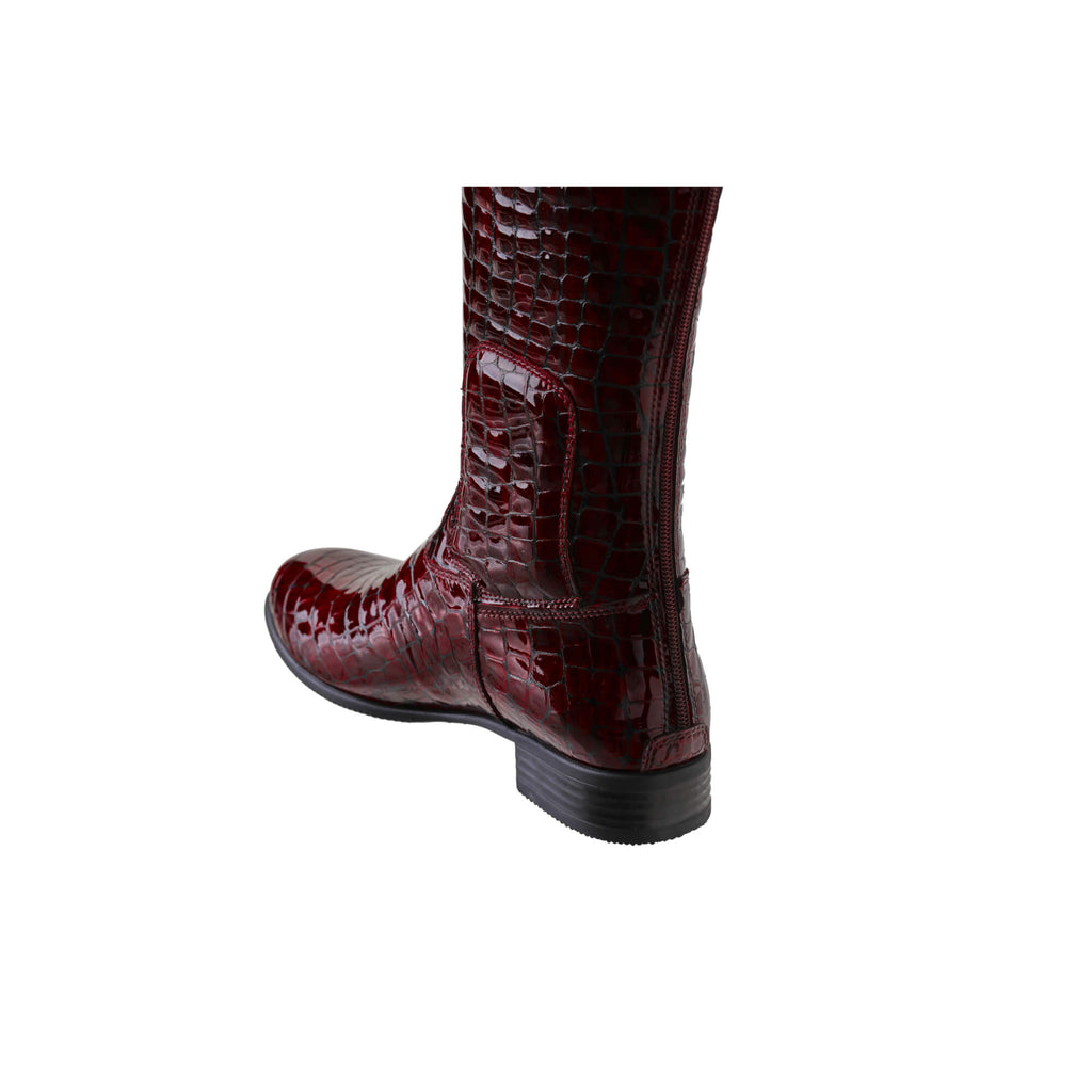  Image of a tall burgundy crocodile leather boot displayed against a white background. The boot features a back zip and a 1.5-2cm stretch feature on the calf area. This image only displays one boot showcased from the back perspective.