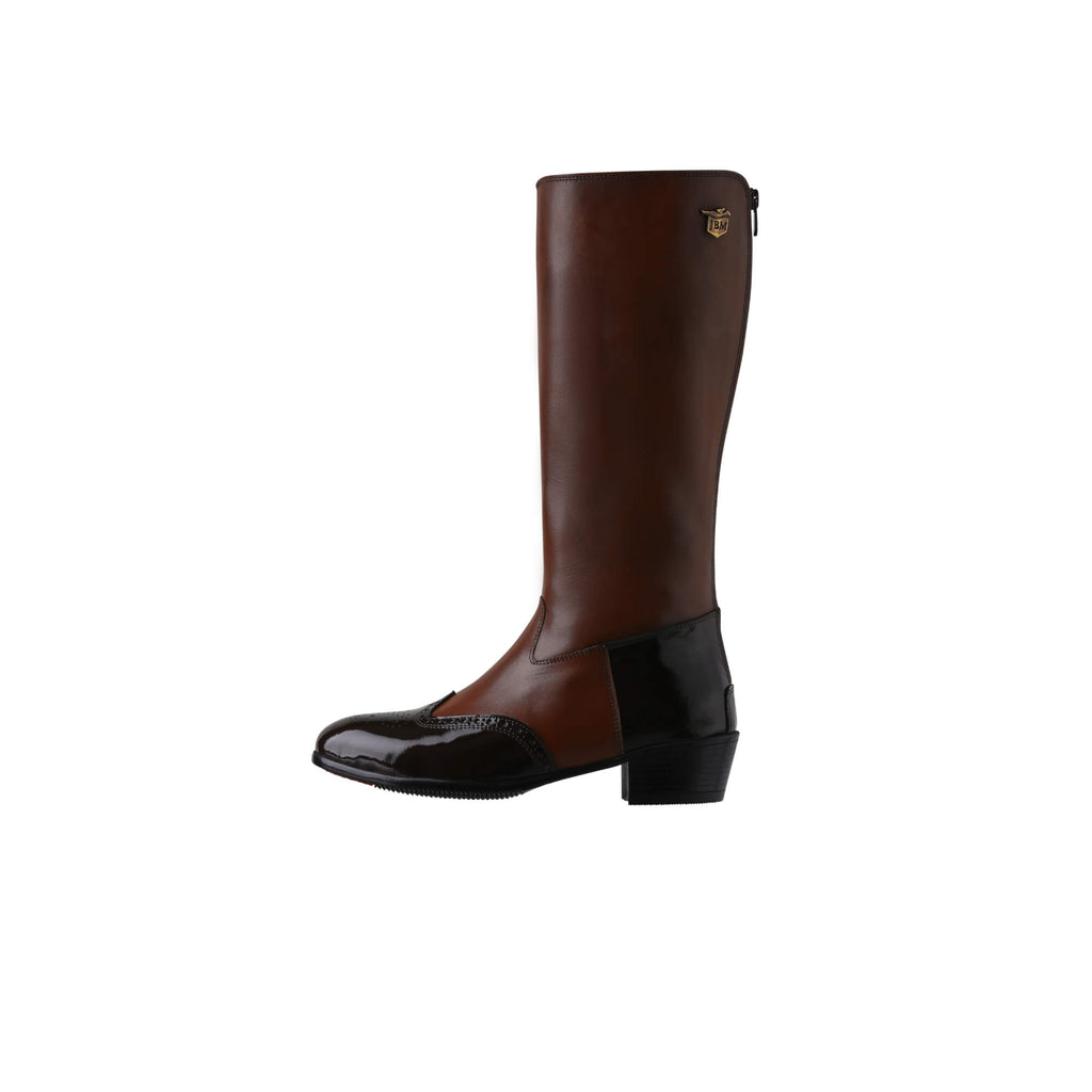 A tall brown leather Cuban heel boot with brown wingtip accents displayed against a white background. The image showcases only one boot from a side perspective, featuring a back zip.