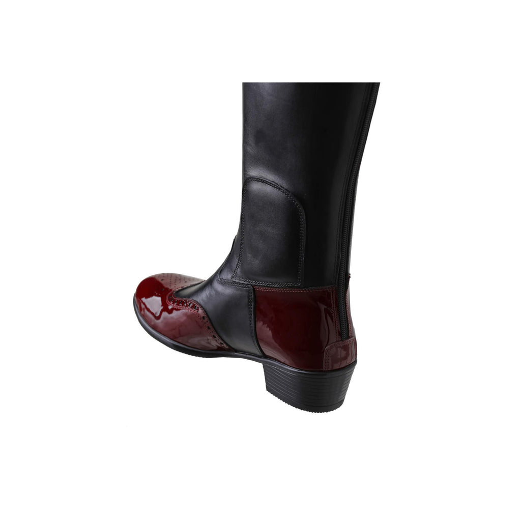 A tall black leather Cuban heel boot with burgundy wingtip accents. The boot features a back zip and is displayed against a white background. This image only displays one boot showcased from the back perspective.